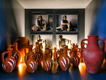 Close-up of statues on table at home