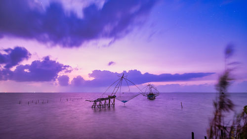 Square dip net with cloudy sky at pakpra, phatthalung, thailand