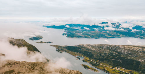 Aerial view of mountain by sea