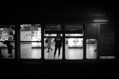 Group of people at railroad station platform