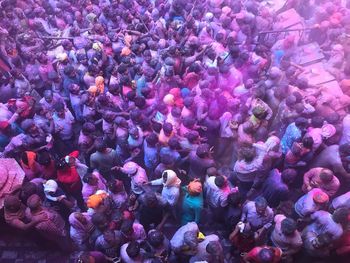 High angle view of people on multi colored flowers