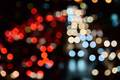 Defocused image of illuminated lights at night