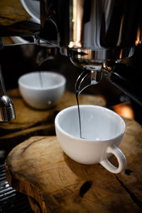 Close-up of coffee cup on table