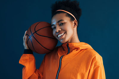 Young man playing basketball