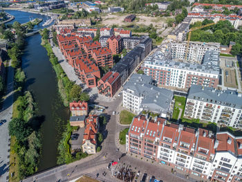 High angle view of street amidst buildings in town, aerial view on new apartments in gdansk, poland