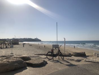 Scenic view of beach against clear sky
