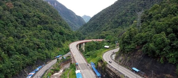 High angle view of road amidst mountains