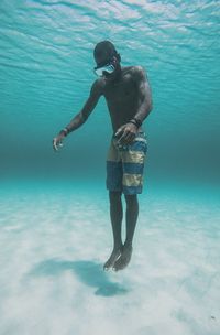 Full length of man swimming in sea