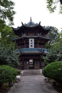 Exterior of temple building against sky