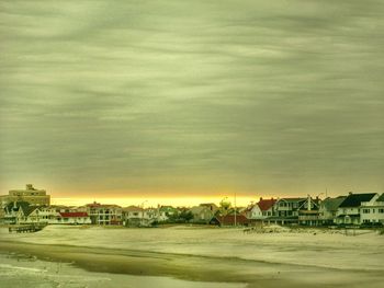 Buildings in city against sky