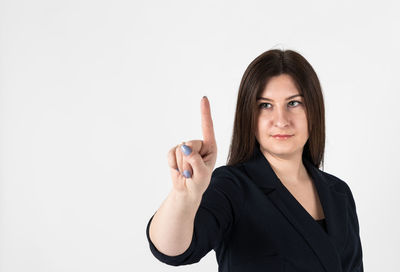 Portrait of a beautiful young woman over white background