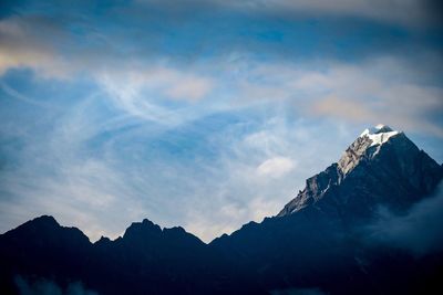 Scenic view of mountains against sky during winter