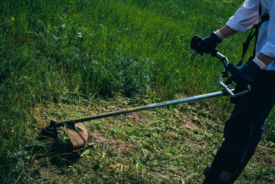 Man standing on grassy field