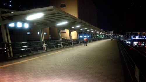 Street lights in illuminated city at night