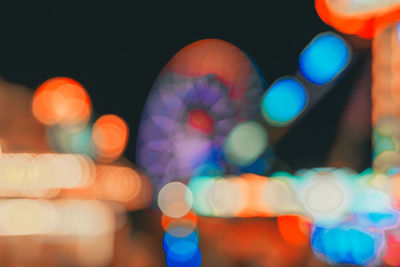 Defocused image of illuminated lights at night