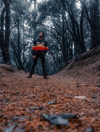 Man riding motorcycle in forest