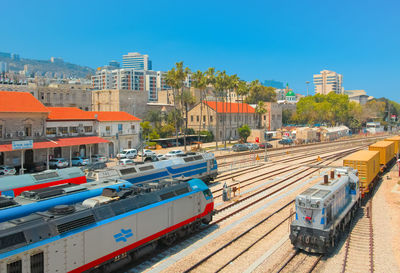 High angle view of railroad tracks against clear blue sky