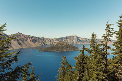 Scenic view of mountains against clear blue sky