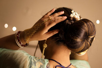 Rear view of woman wearing mask