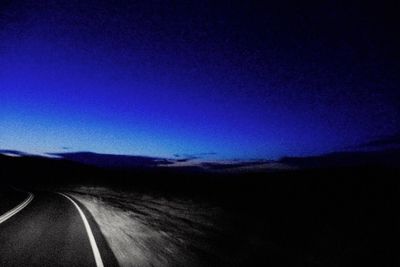 Country road passing through landscape