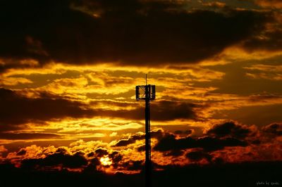 Low angle view of cloudy sky at sunset