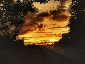 Scenic view of silhouette trees against sky during sunset