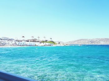 Scenic view of sea against clear blue sky