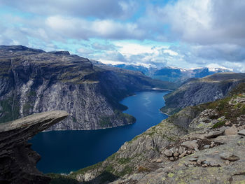 Panoramic view of lake and mountains against sky