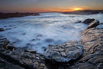 Scenic view of sea against sky during sunset