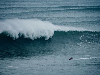 High angle view of people on sea