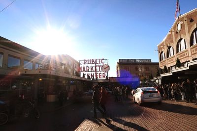 Sun shining through city