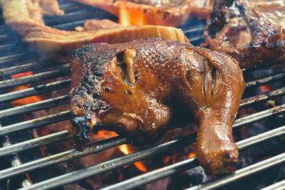 Close-up of meat on barbecue grill