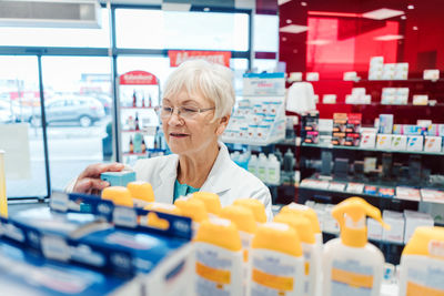 Portrait of woman standing in supermarket