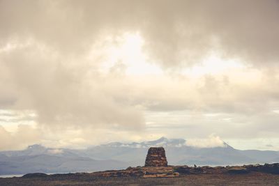 View of castle against cloudy sky