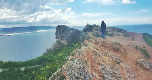 Scenic view of sea against cloudy sky