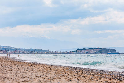 Scenic view of beach against sky