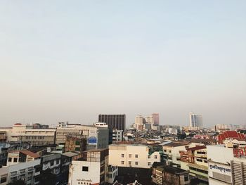 High angle view of buildings against clear sky