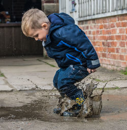 Boy standing outdoors