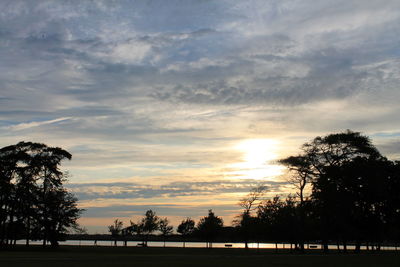 Scenic view of landscape against cloudy sky