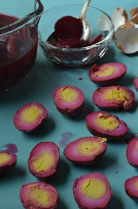 Close-up of colorful pickled eggs