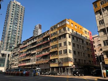 Low angle view of buildings against clear sky