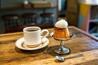 Close-up of coffee served on table