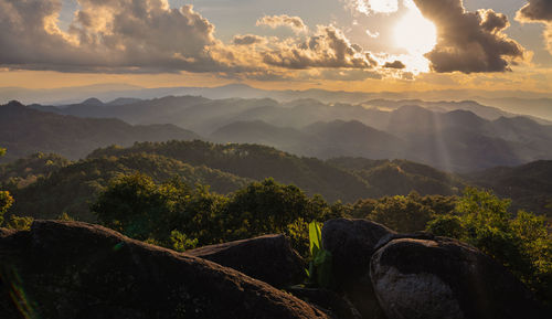 Scenic view of mountains against sky during sunset