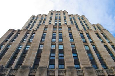 Low angle view of modern building against sky
