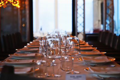 Wine glasses on table at restaurant