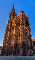 Low angle view of historic building against clear sky