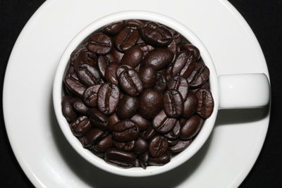 High angle view of coffee beans in bowl