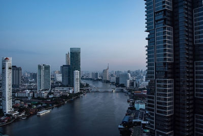 Buildings in city against sky