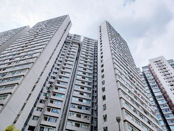 Low angle view of modern buildings against sky