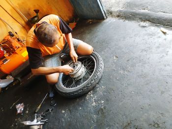 High angle view of man working in water